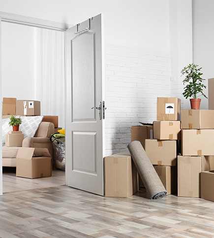 Boxes and packages moving into multifamily property building